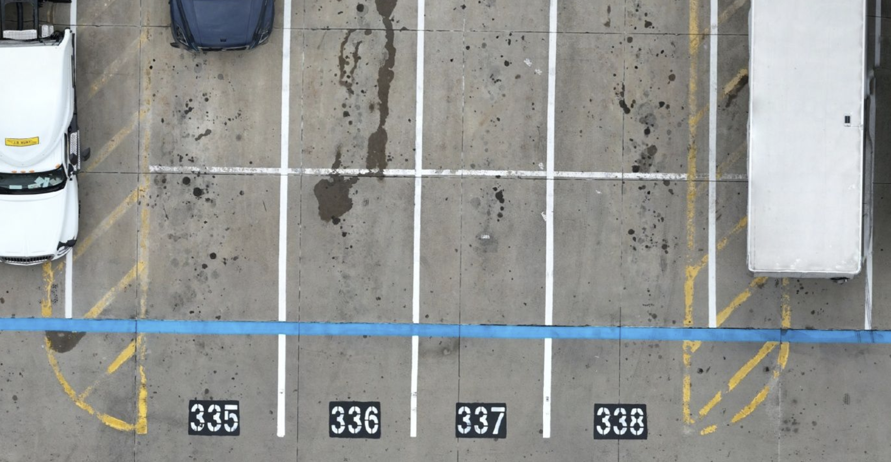 Parking lot and semi trucks for a large distribution chain pavement inspection